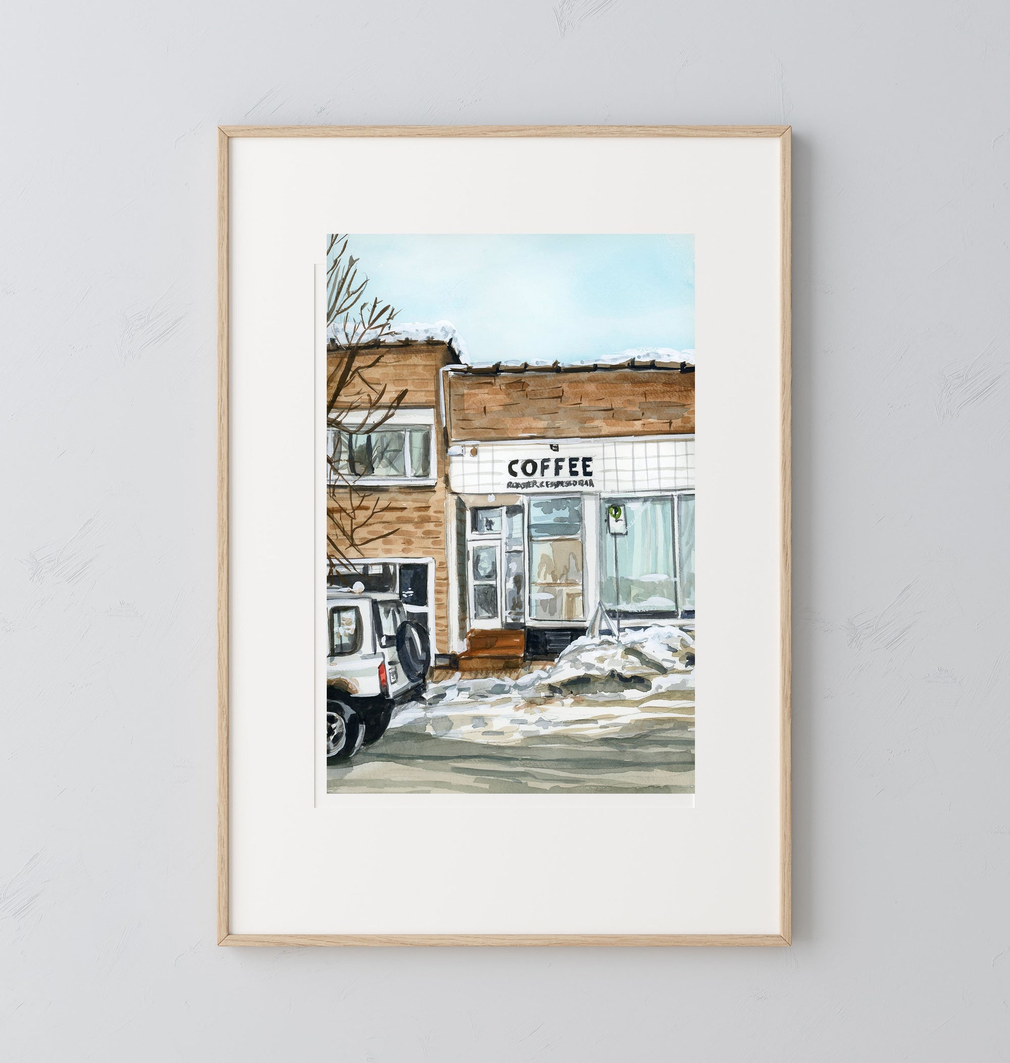 Winter coffee shop print of painting by Medjool Studio. Print of an original gouache painting that captures the charming essence of the mountain town of Kimberly, British Columbia featuring the iconic Kick Turn Coffee Shop.